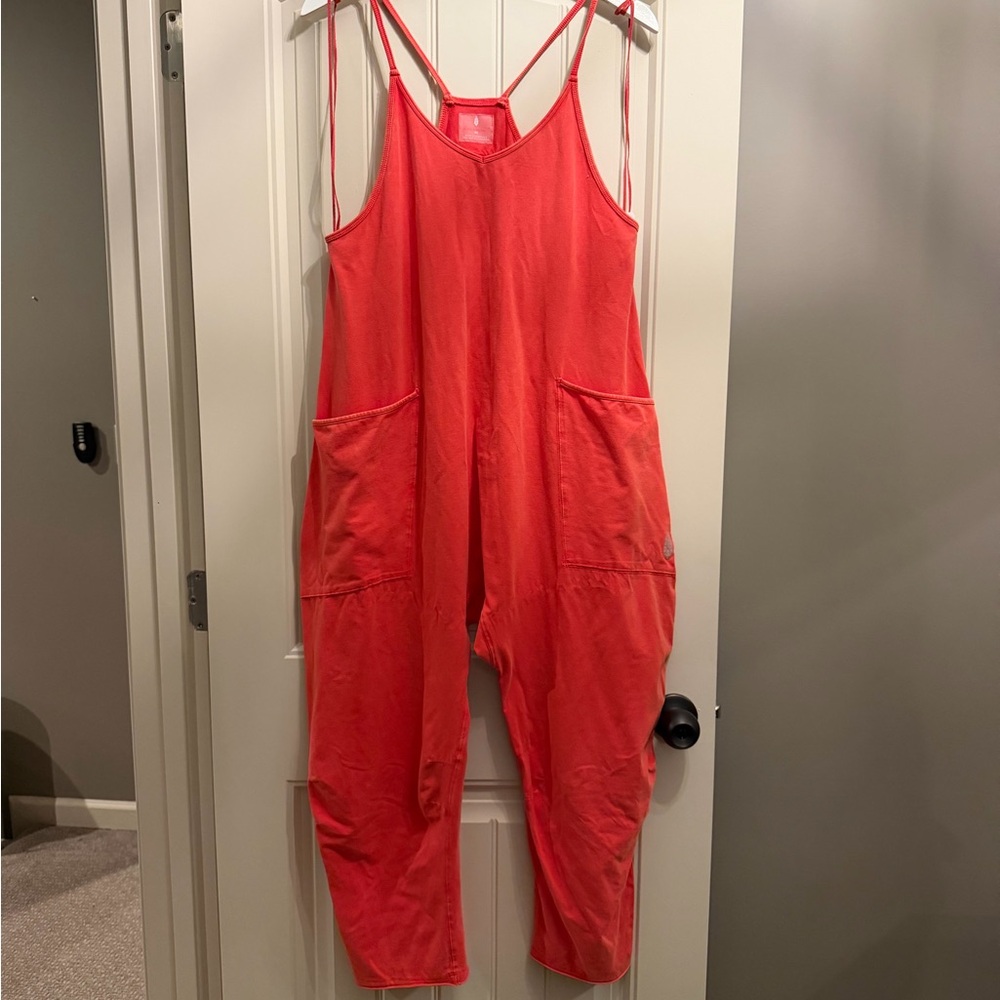 NWT Free People Movement Romper. Washed winter berry,Coral Jumpsuit with Pockets